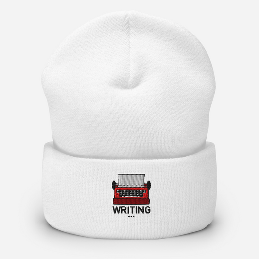 White beanie with a red typewriter and 'WRITING' text on a white background